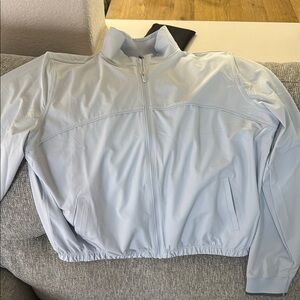 Light blue lululemon jacket - brand new - size 10